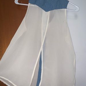 Sleeveless sheer button up blouse